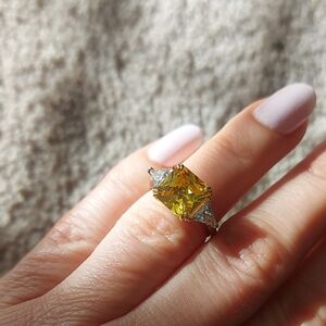 Silver ring with yellow and white zirconia